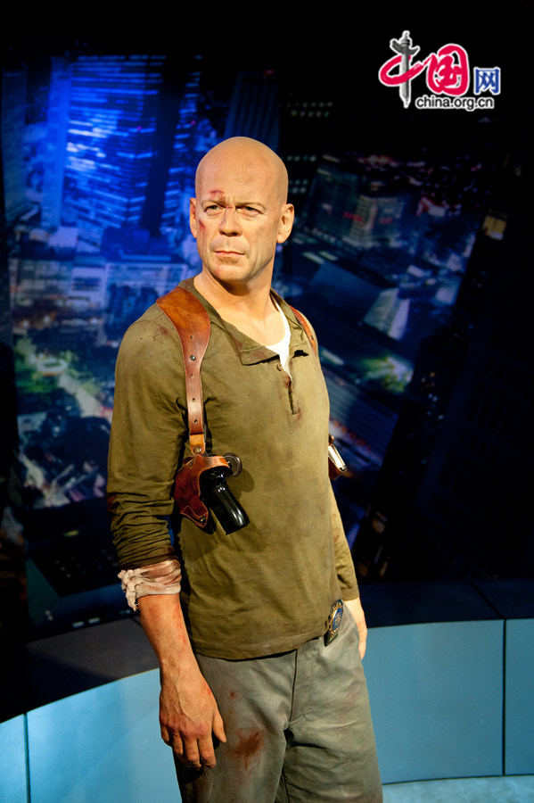 A wax figure of Bruce Willis is on display at Madame Tussauds Beijing on Thursday. The wax museum will be officially open to public on May 31, 2014. [Photo by Chen Boyuan / China.org.cn]