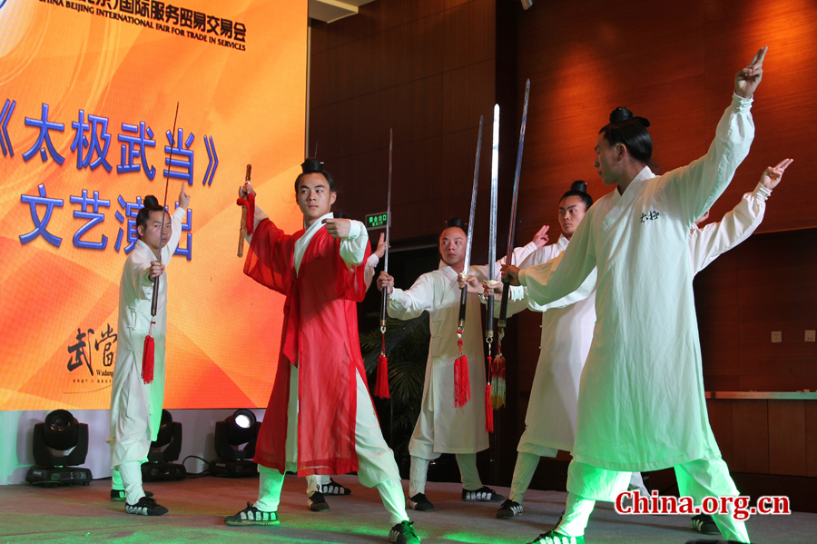 A Kongfu opera performed by China Wudang Taichi Kongfu Troupe stages at the Third China Beijing International Fair for Trade in Services (CIFTIS) Saturday in Beijing. Mt. Wudang, located in Hubei Province in Central China, is famous for the ancient martial art of Taichi and was made a UNESCO World Heritage Site in 1994. [Photo: China.org.cn]