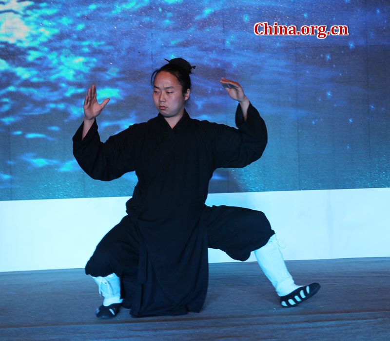 A Kongfu opera performed by China Wudang Taichi Kongfu Troupe stages at the Third China Beijing International Fair for Trade in Services (CIFTIS) Saturday in Beijing. Mt. Wudang, located in Hubei Province in Central China, is famous for the ancient martial art of Taichi and was made a UNESCO World Heritage Site in 1994. [Photo: China.org.cn]