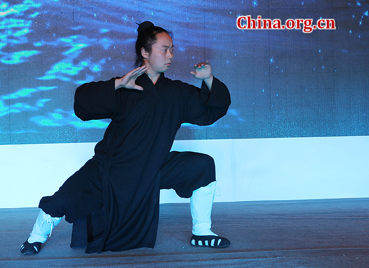 A Kongfu opera performed by China Wudang Taichi Kongfu Troupe stages at the Third China Beijing International Fair for Trade in Services (CIFTIS) Saturday in Beijing. Mt. Wudang, located in Hubei Province in Central China, is famous for the ancient martial art of Taichi and was made a UNESCO World Heritage Site in 1994. [Photo: China.org.cn]