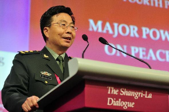 Wang Guanzhong, deputy chief of the General Staff of the Chinese People's Liberation Army, speaks during the fourth plenary session of the 13th Shangri-La Dialogue in Singapore June 1, 2014, the final day of the multilateral forum focusing on security issues in Asia. [Then Chih Wey/Xinhua]    