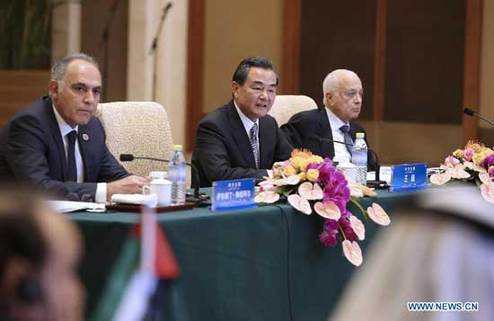 Chinese Foreign Minister Wang Yi (C) attends the sixth ministerial conference of the China-Arab States Cooperation Forum (CASCF) and delivers a keynote speech in Beijing, capital of China, June 5, 2014. [Xinhua]