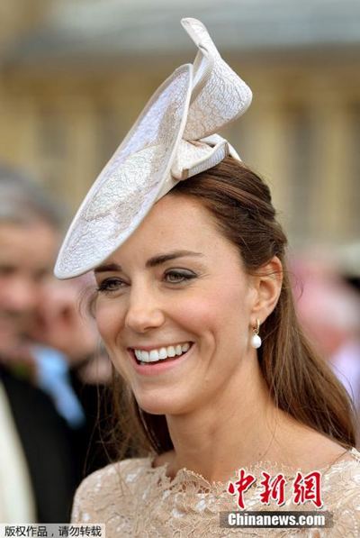 Kate Middleton Stuns In Lace Alexander McQueen Dress For The