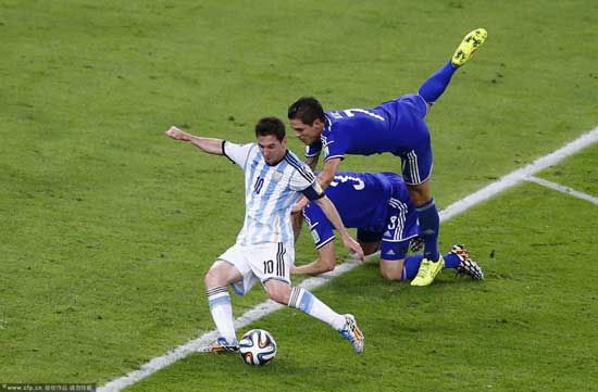 Lionel Messi scored a stunning second-half goal to push Argentina to a 2-1 victory over World Cup debutant Bosnia at the Maracana stadium on Sunday in the Group F opener for both teams.