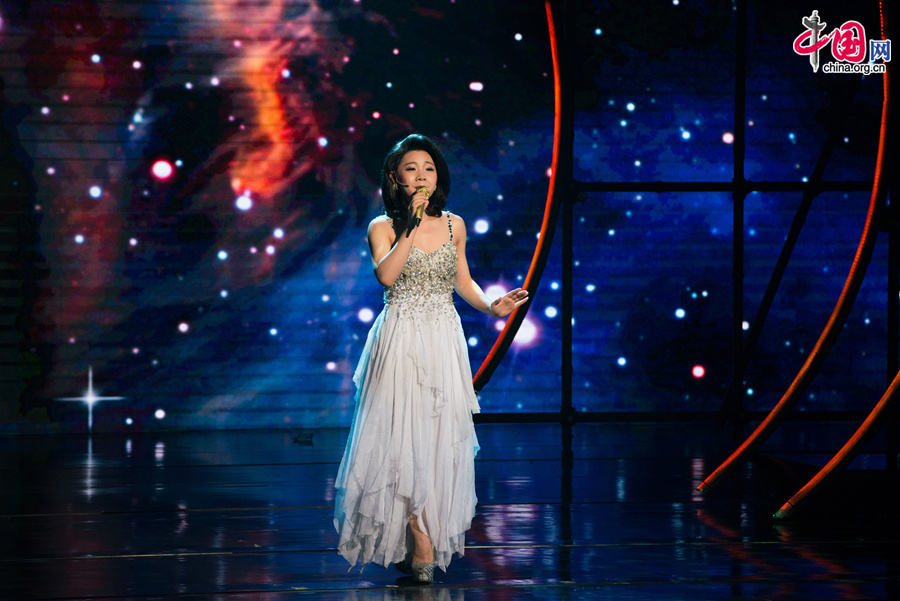 Artists stage a musical &apos;Love you, Teresa,&apos; in memory of late Chinese pop legend Teresa Teng (1953-1995) in Beijing on Tuesday, June 17, 2014. [Photo by Chen Boyuan / China.org.cn]