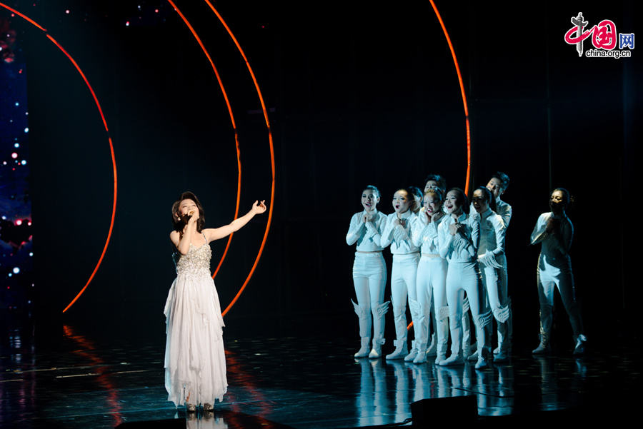 AArtists stage a musical &apos;Love you, Teresa,&apos; in memory of late Chinese pop legend Teresa Teng (1953-1995) in Beijing on Tuesday, June 17, 2014. [Photo by Chen Boyuan / China.org.cn]