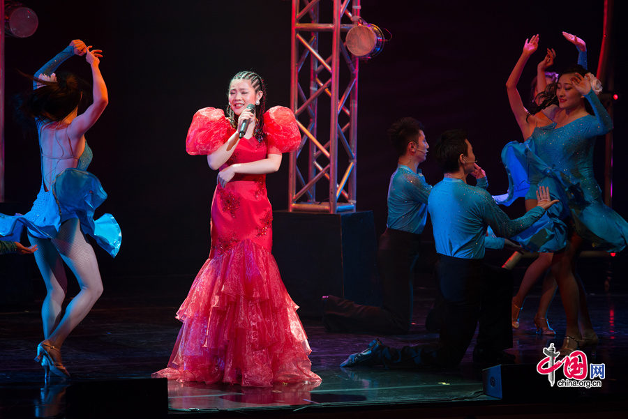 Artists stage a musical &apos;Love you, Teresa,&apos; in memory of late Chinese pop legend Teresa Teng (1953-1995) in Beijing on Tuesday, June 17, 2014. [Photo by Chen Boyuan / China.org.cn]