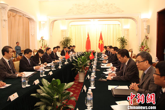 Chinese State Councillor Yang Jiechi holds talks with Vietnamese Deputy Prime Minister and Foreign Minister Pham Binh Minh in Hanoi.
