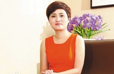 Yu Youjing, 40, is arrested in Uganda on July 2, 2014. [File photo]