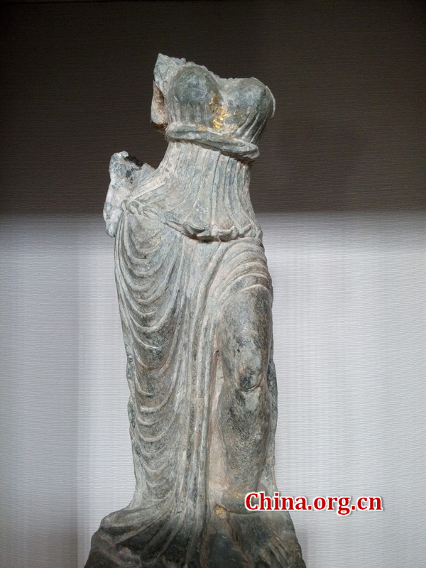 The remain of a Buddha statue in the museum [By Li Shen/China.org.cn]