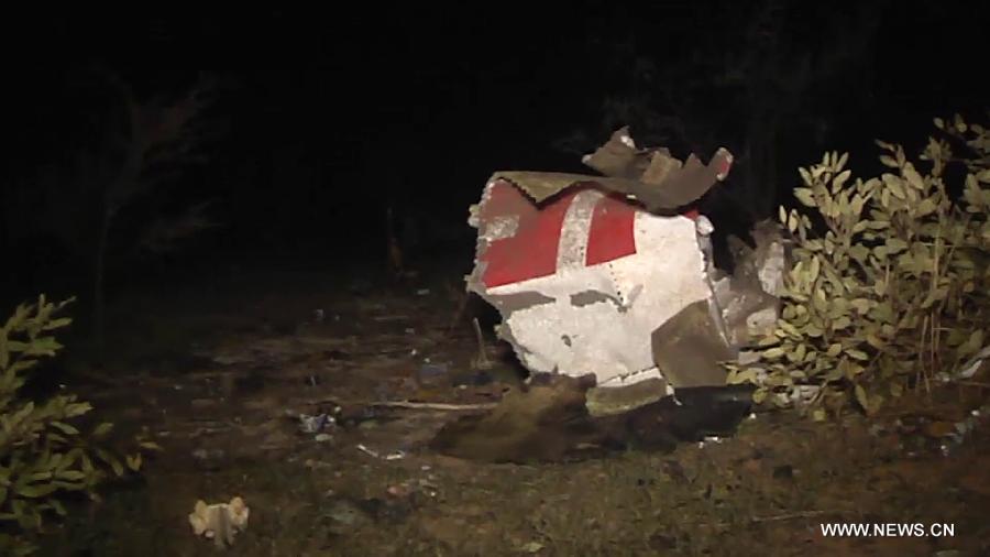 Photo released on July 25, 2014 by French Defense Ministry shows a scene of the crash site in north Mali. 