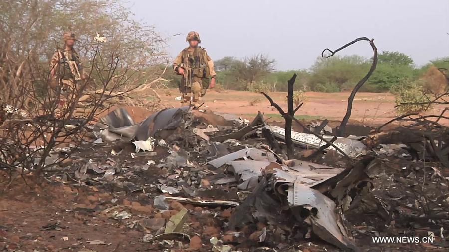 Photo released on July 25, 2014 by French Defense Ministry shows a scene of the crash site in north Mali.