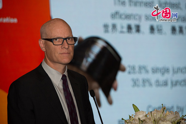 Christopher Norris, founder and CEO of Alta Deveices delivers a speech at the signing ceremony that cement the Hanergy acquisition of Alta Devices on Wednesday, Aug. 13, 2014 in Beijing. [Photo by Chen Boyuan / China.org.cn]