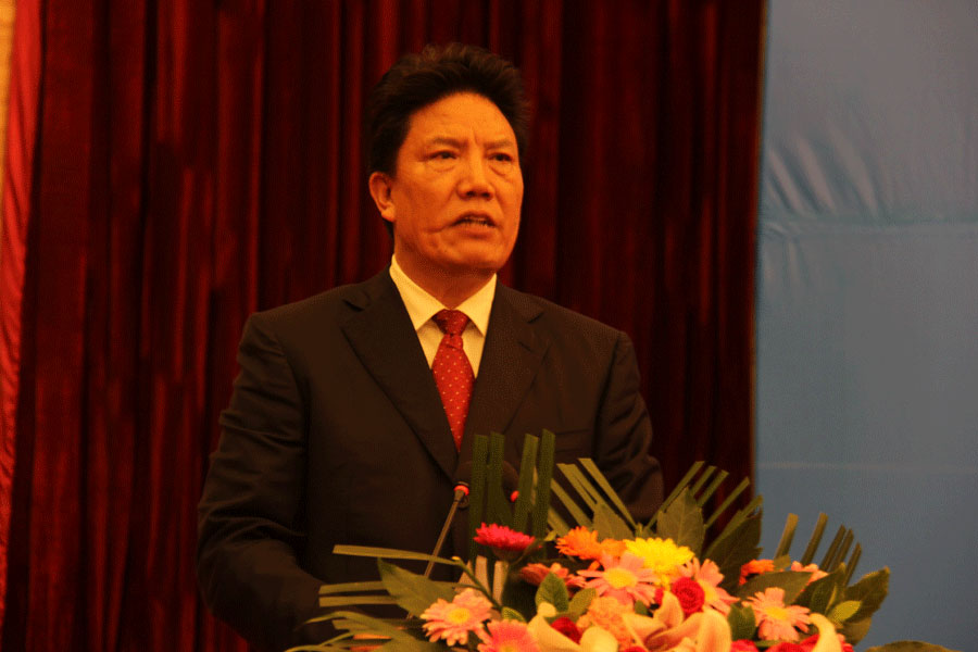 Chairman of the government of Tibet Autonomous Region Losang Jamcan delivering a welcome speech to delegates attending the Tibet Development Forum, the forum opens on Tuesday morning, August 12, 2014. [Photo: CRIENGLISN/Hai Peng]