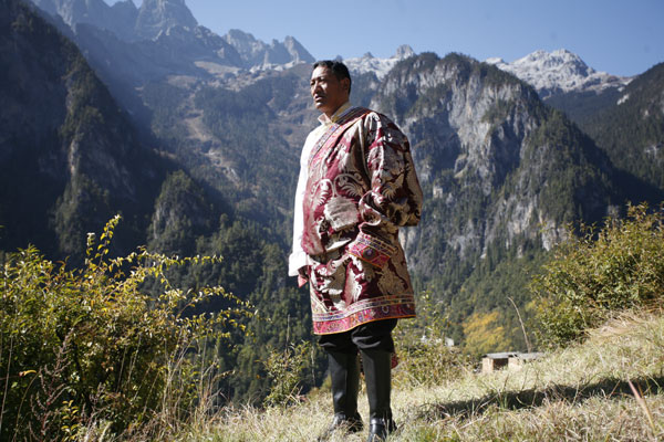 Sina Dingdru at the Bara Gedzong Snow Mountain in Yunnan province in 2009. Provided to China Daily 