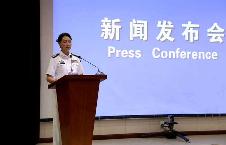 The PLA Navy's first spokeswoman, Senior Colonel Xing Guangmei, addresses a press conference in Weihai, Shandong Province, on August 26, 2014. This is her first public appearance after taking the post last November. [Photo: mod.gov.cn]