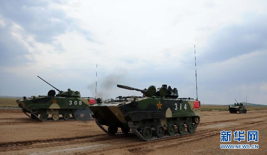 The exercise is being held from Aug. 24 to 29 at Zhurihe training base in Inner Mongolia Autonomous Region, in accordance with the 2014-2015 defense ministry cooperation plan among Shanghai Cooperation Organization (SCO) members. Spokesperson Yang Yujun told a regular news briefing the drill is progressing smoothly, with troop exercises beginning Friday. [Photo/Xinhua]