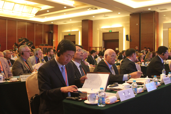 Participants at the opening ceremony of The Party and the World Dialogue 2014. [Photo/China.org.cn by Guo Xiaohong]