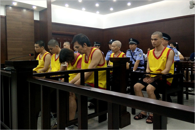 Suspects involved in growing and selling 14,000 kilos of toxic bean sprouts stand trial in Haizhu Court in Guangzhou, south China's Guangdong province on Wednesday, September 3, 2014. The gang leader Pan Mian is sentenced to four-years of imprisonment with a fine of 50,000 yuan (about $8,142 USD). [Photo: CRIENGLISH.com]