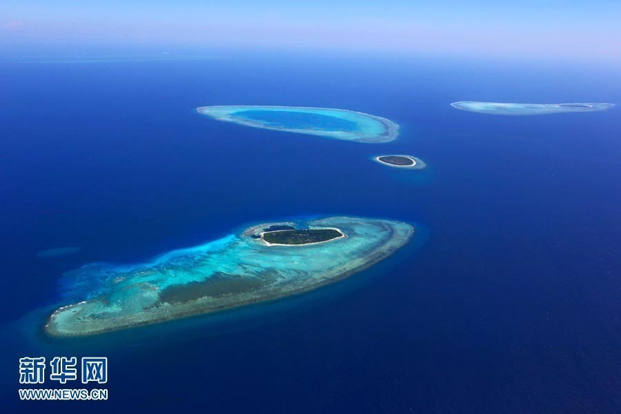 Above, the image shows the scenery of the Xisha Islands. The 45 islets that make up this beautiful Chinese archipelago are distributed over an area 250 kilometers long by 150 kilometers wide. A photo album 'The Xisha Islands' by Xinhua senior reporter Zha Chunming has been published by China Photography Press.[Photo: Xinhua/ Zha Chunming]