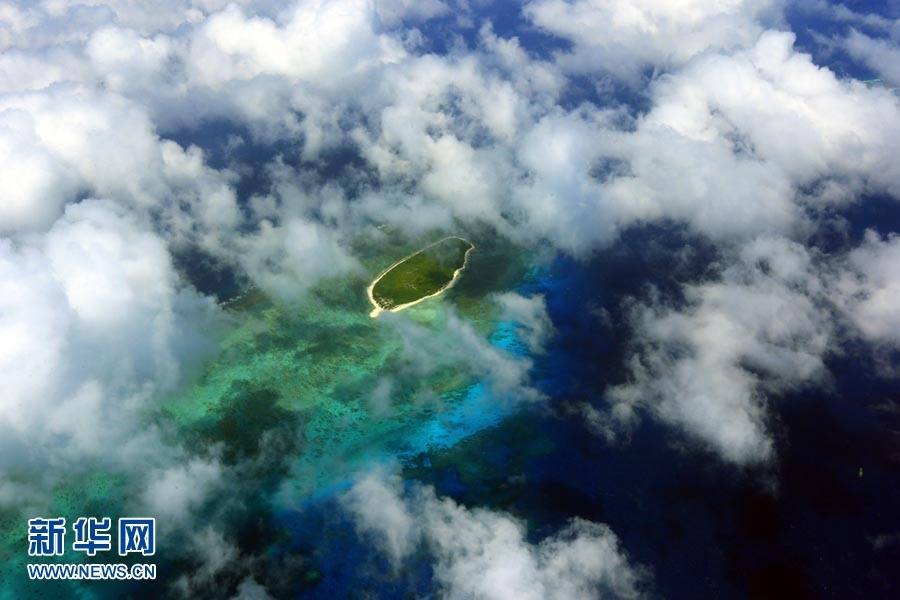 Above, the image shows the scenery of the Xisha Islands. The 45 islets that make up this beautiful Chinese archipelago are distributed over an area 250 kilometers long by 150 kilometers wide. A photo album 'The Xisha Islands' by Xinhua senior reporter Zha Chunming has been published by China Photography Press.[Photo: Xinhua/ Zha Chunming]