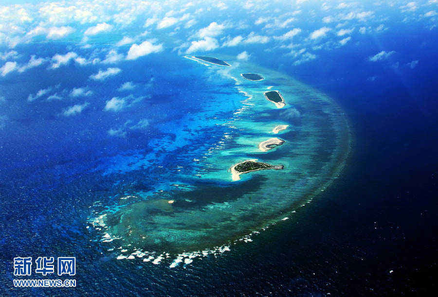 Above, the image shows the scenery of the Xisha Islands. The 45 islets that make up this beautiful Chinese archipelago are distributed over an area 250 kilometers long by 150 kilometers wide. A photo album 'The Xisha Islands' by Xinhua senior reporter Zha Chunming has been published by China Photography Press.[Photo: Xinhua/ Zha Chunming]