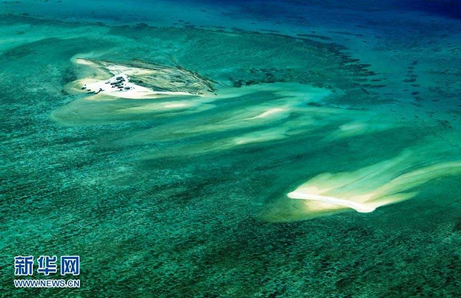 Above, the image shows the scenery of the Xisha Islands. The 45 islets that make up this beautiful Chinese archipelago are distributed over an area 250 kilometers long by 150 kilometers wide. A photo album 'The Xisha Islands' by Xinhua senior reporter Zha Chunming has been published by China Photography Press.[Photo: Xinhua/ Zha Chunming]