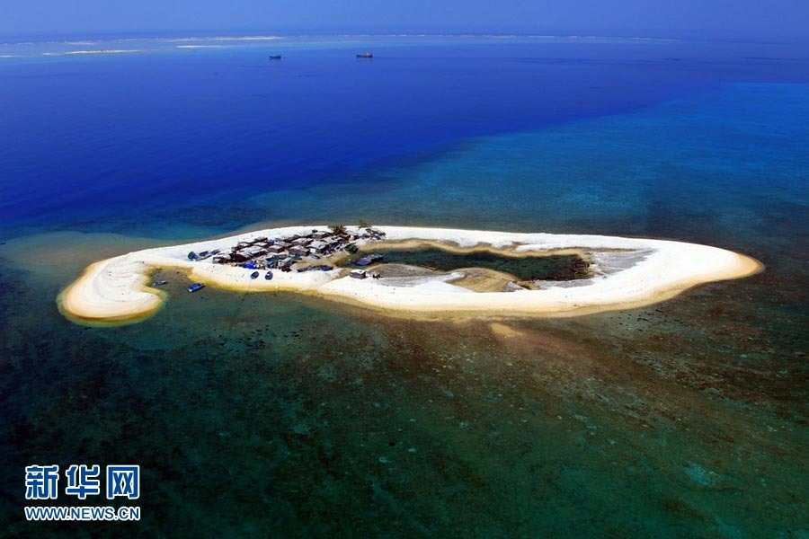 Above, the image shows the scenery of the Xisha Islands. The 45 islets that make up this beautiful Chinese archipelago are distributed over an area 250 kilometers long by 150 kilometers wide. A photo album 'The Xisha Islands' by Xinhua senior reporter Zha Chunming has been published by China Photography Press.[Photo: Xinhua/ Zha Chunming] 