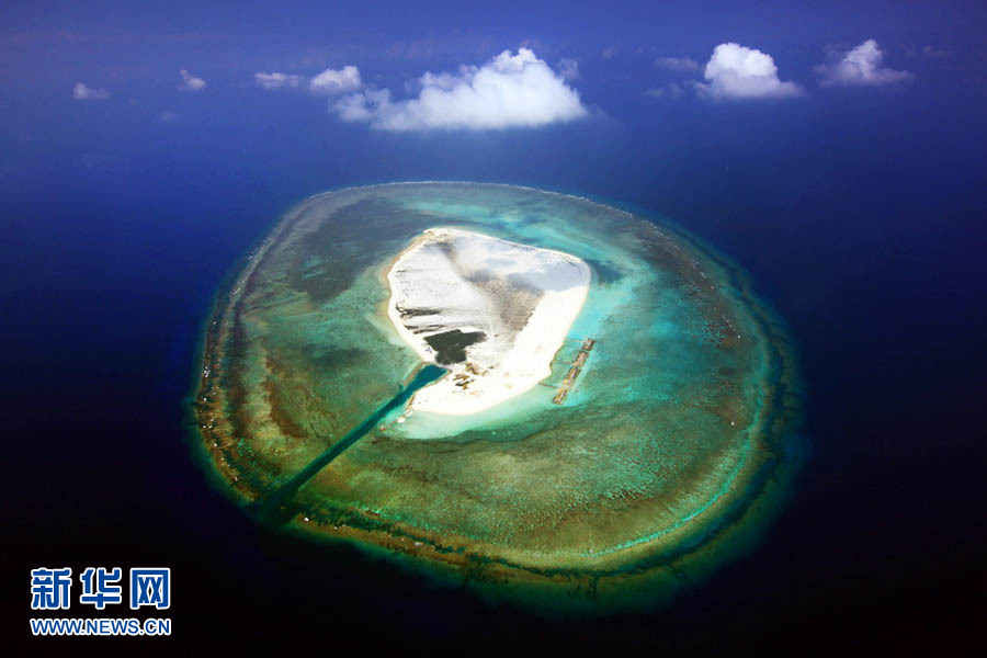 Above, the image shows the scenery of the Xisha Islands. The 45 islets that make up this beautiful Chinese archipelago are distributed over an area 250 kilometers long by 150 kilometers wide. A photo album 'The Xisha Islands' by Xinhua senior reporter Zha Chunming has been published by China Photography Press.[Photo: Xinhua/ Zha Chunming]