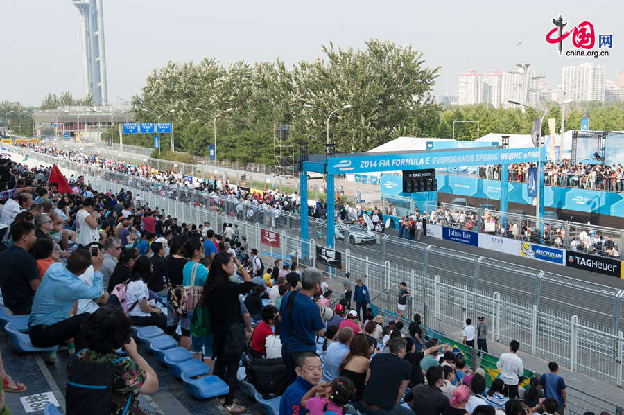 The FIA Formula E Championship, which is also referred to as the electric version of the Formula One (F1) race, holds its inaugural ePrix in Beijing on Saturday, Sept. 13, 2014. The annual Formula E Championship will feature 10 ePrix. The next race will be held in Malaysia in middle November of this year. [Photo by Chen Boyuan / China.org.cn]