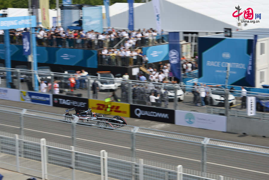 The FIA Formula E Championship, which is also referred to as the electric version of the Formula One (F1) race, holds its inaugural ePrix in Beijing on Saturday, Sept. 13, 2014. The annual Formula E Championship will feature 10 ePrix. The next race will be held in Malaysia in middle November of this year. [Photo by Chen Boyuan / China.org.cn]