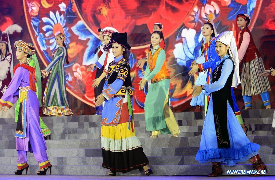 Contestants attend the evening dress session of the 9th Miss China Pageant final in Zhangbei county, north China's Hebei Province, Sept. 13, 2014.