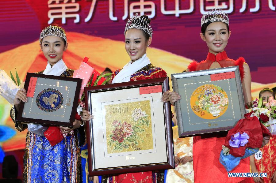 Contestants attend the evening dress session of the 9th Miss China Pageant final in Zhangbei county, north China's Hebei Province, Sept. 13, 2014.