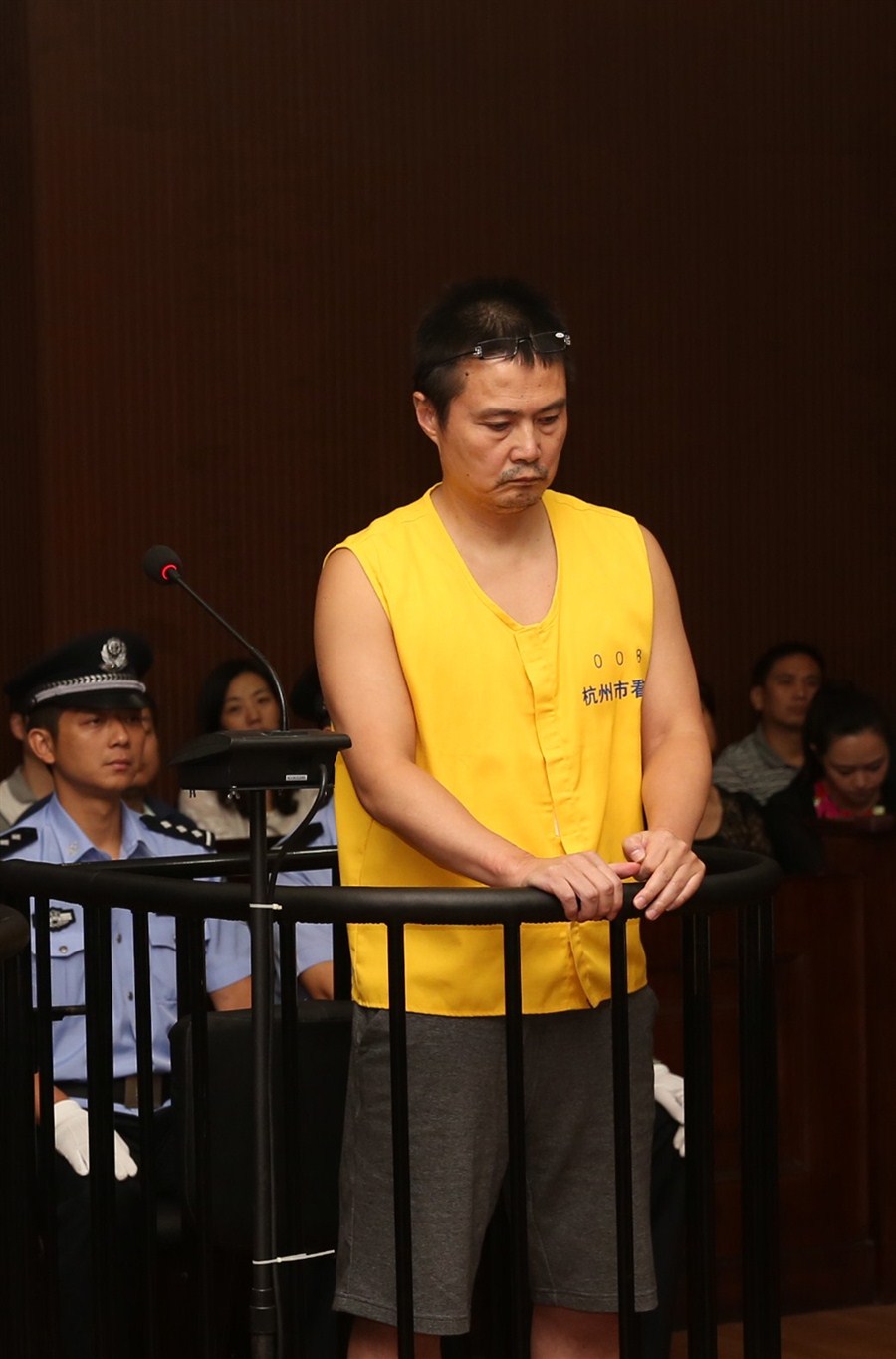Zhang Xin stands in the dock at the Hangzhou Intermediate People’s Court. — Xinhua 