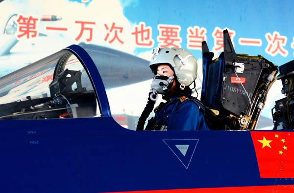 A female fighter pilot takes part in training at the PLA August 1st Air Demonstration Team base in Tianjin on Tuesday. Zhang Pengyan / for China Daily