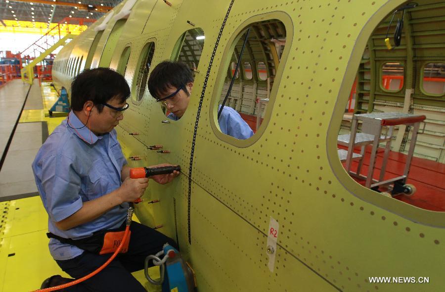 China's 1st C919 airliner starts structural assembly in Shanghai