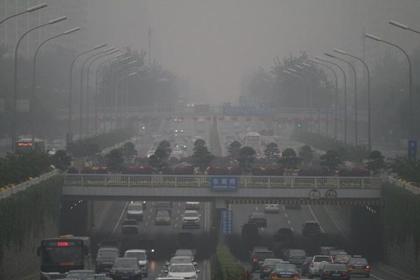 Beijing issued a yellow alert for air pollution on Wednesday with smog forecast to continue for the next three days.
