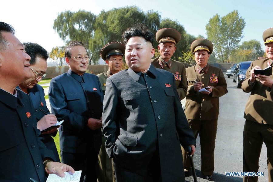 This undated photo provided by Korean Central News Agency (KCNA) shows top leader of the Democratic People&apos;s Republic of Korea (DPRK) Kim Jong Un (C) giving field guidance to the completed apartment houses for educators of Kim Chaek University of Technology.