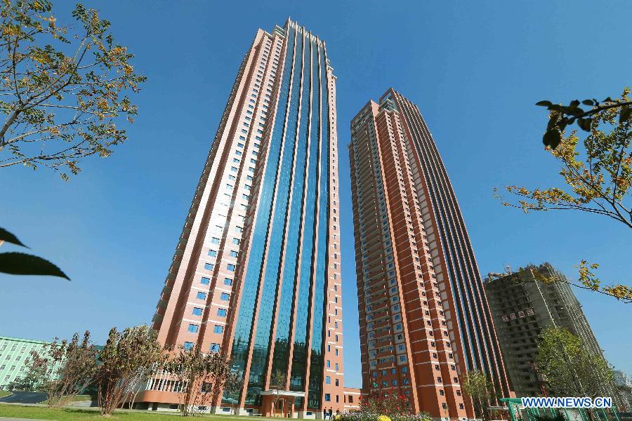 This undated photo provided by Korean Central News Agency (KCNA) shows the completed apartment houses for educators of Kim Chaek University of Technology. 