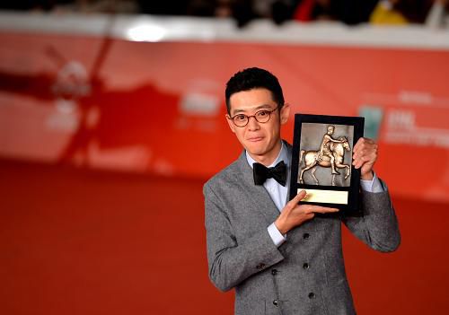 Chinese director Xu Ang's legal drama, '12 Citizens,' won the 'cinema today' people's choice award over the weekend at the conclusion of the Rome Film Festival. [Xinhua]