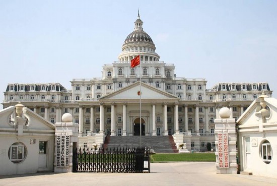 A district government building that is called the 'White House' by locals in Yingquan District of Fuyang, east China's Anhui Province. [File photo]