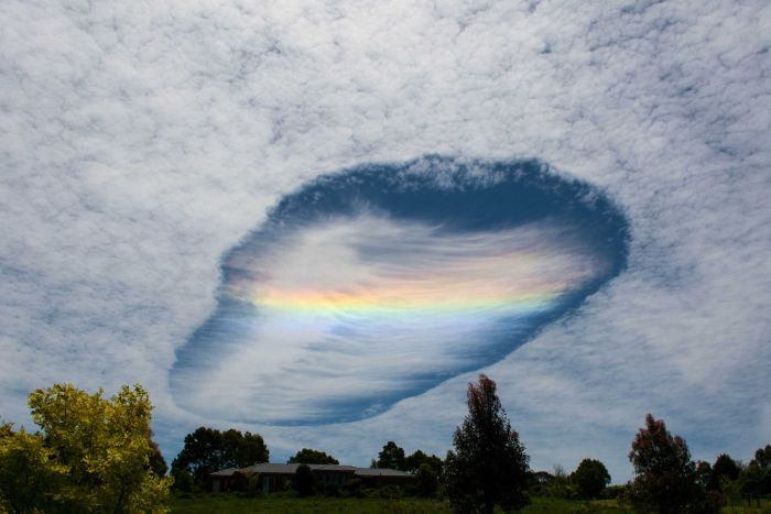 An amazing fallstreak hole appears over a town in Australia's Victoria State on Nov. 3. 