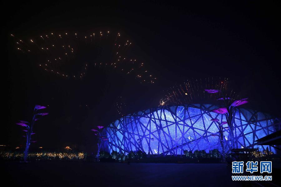 A massive spetacular fireworks display is staged at Beijing&apos;s Olympic Park on the evening of Monday, Nov. 10, the eve of the 22nd APEC Summit meeting to be held in Beijing, China. [Xinhua]