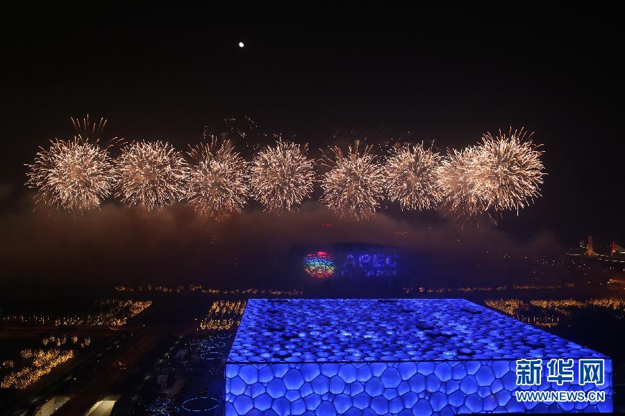 A massive spetacular fireworks display is staged at Beijing&apos;s Olympic Park on the evening of Monday, Nov. 10, the eve of the 22nd APEC Summit meeting to be held in Beijing, China. [Xinhua]