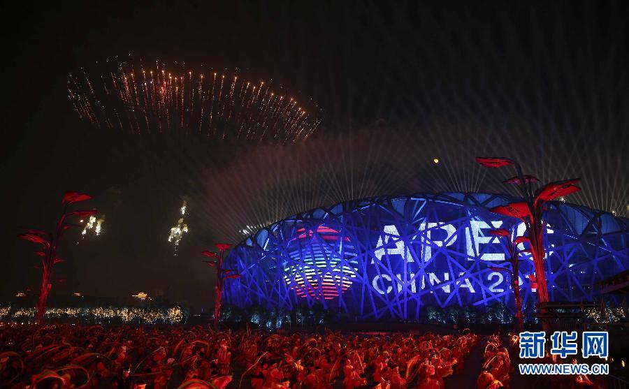 A massive spetacular fireworks display is staged at Beijing&apos;s Olympic Park on the evening of Monday, Nov. 10, the eve of the 22nd APEC Summit meeting to be held in Beijing, China. [Xinhua]