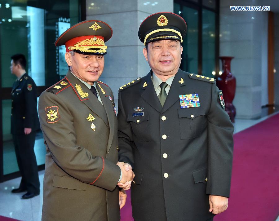 Chinese Defence Minister Chang Wanquan (R) meets with Russian Defence Minister Sergei Shoigu in Beijing, capital of China, Nov. 18, 2014. [Photo/Xinhua]
