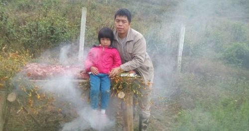 The father burns herbs to try to cure his daughter, Nov 25. 