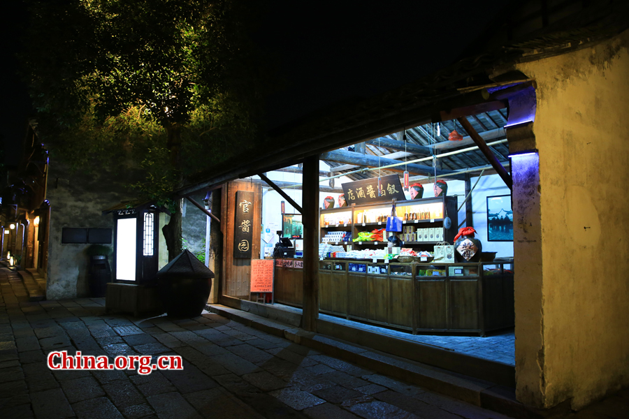 Wuzhen is a historic scenic town, part of Tongxiang, located in northern China's Zhejiang Province. The canals of Wuzhen have led to it being nicknamed the 'Venice of the East.' The picture shows the night view of Wuzhen. [Photo/China.org.cn by He Shan]