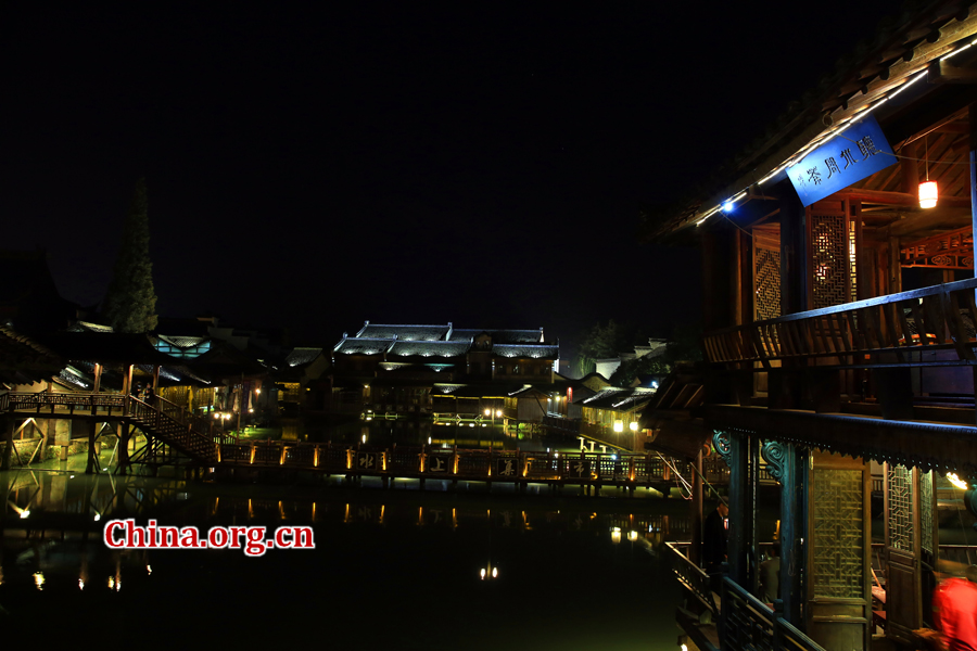 Wuzhen is a historic scenic town, part of Tongxiang, located in northern China's Zhejiang Province. The canals of Wuzhen have led to it being nicknamed the 'Venice of the East.' The picture shows the night view of Wuzhen. [Photo/China.org.cn by He Shan]