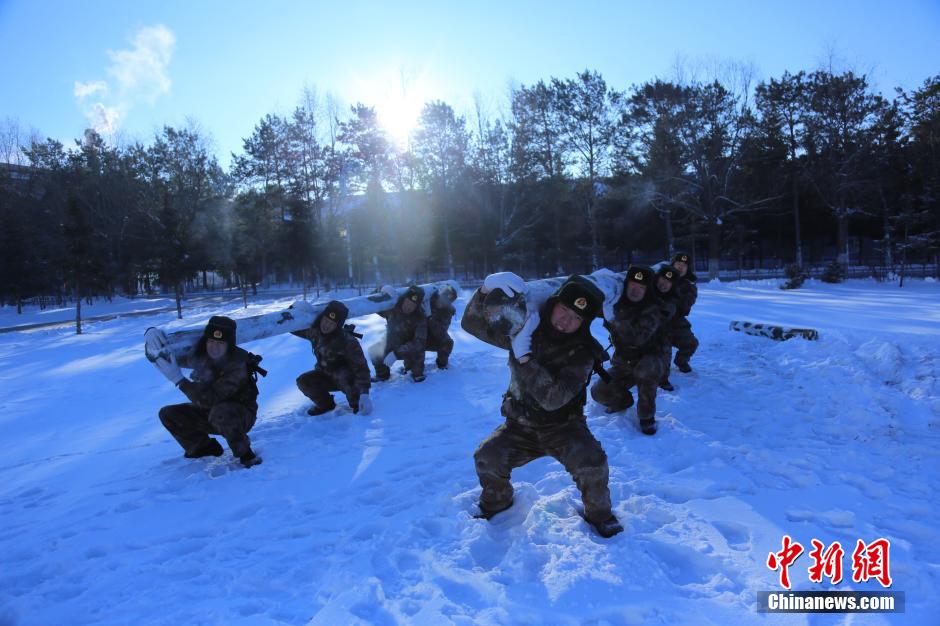 Soldiers garrisoning a fort in northeast China&apos;s Heilongjiang Province defy extreme coldness and conduct trainings at an undisclosed military camp on Saturday, Dec. 20. [Photo / CNS]